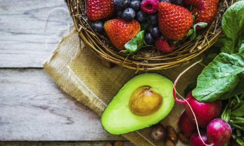 Fruits and vegetables on rustic background